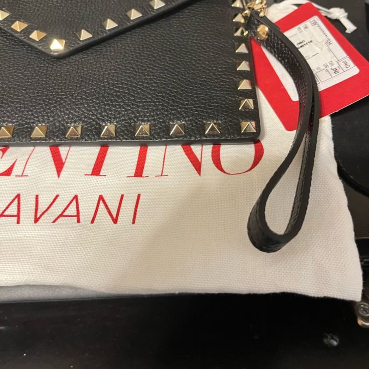 Brand New Valentino Garavani Black Calf Skin Envelope Pouch. Not Org Strap Designer Shoulder Bag Pouch, Designer Black Top Handle Pouch, Designer Rectangular Pouch For Evening, Luxury Clutch Pouch For Shopping, Luxury Shopping Clutch Pouch, Designer Crossbody Evening Bag, Designer Clutch With Gold-tone Hardware, Designer Crossbody Evening Bag For Shopping, Designer Clutch Pouch For Shopping