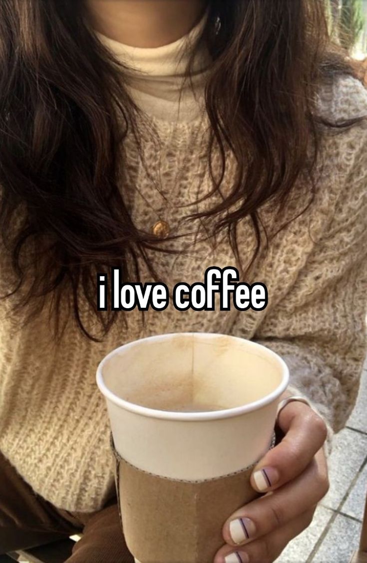 a woman holding a coffee cup with the words i love coffee