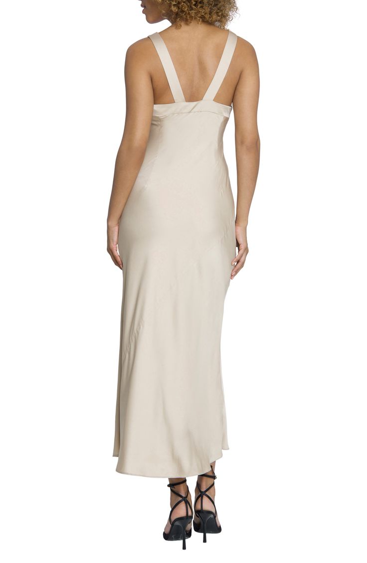 A drapey cowl neckline sets the mood for this romantic gown made from a lightweight fabric with a subtle sheen. 57" length Hidden side-zip closure Cowl neck Sleeveless Lined 97% polyester, 3% spandex Dry clean Imported Bias Cut Pre-draped Slip Dress For Wedding, Feminine Maxi Dress For Wedding Night, Bias Cut Draped Evening Dress, Bias Cut Pre-draped Slip Dress, Draped Bias Cut Slip Dress For Gala, Wedding Gown With Asymmetrical Neckline And Bias Cut, Bias Cut Slip Dress With Cowl Back For Evening, Wedding Maxi Dress With Asymmetrical Neckline And Bias Cut, Draped Bias Cut Maxi Dress For Wedding