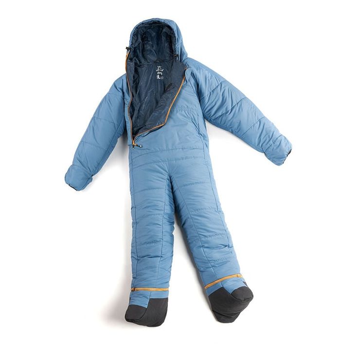 a blue snowsuit laying on top of a white floor