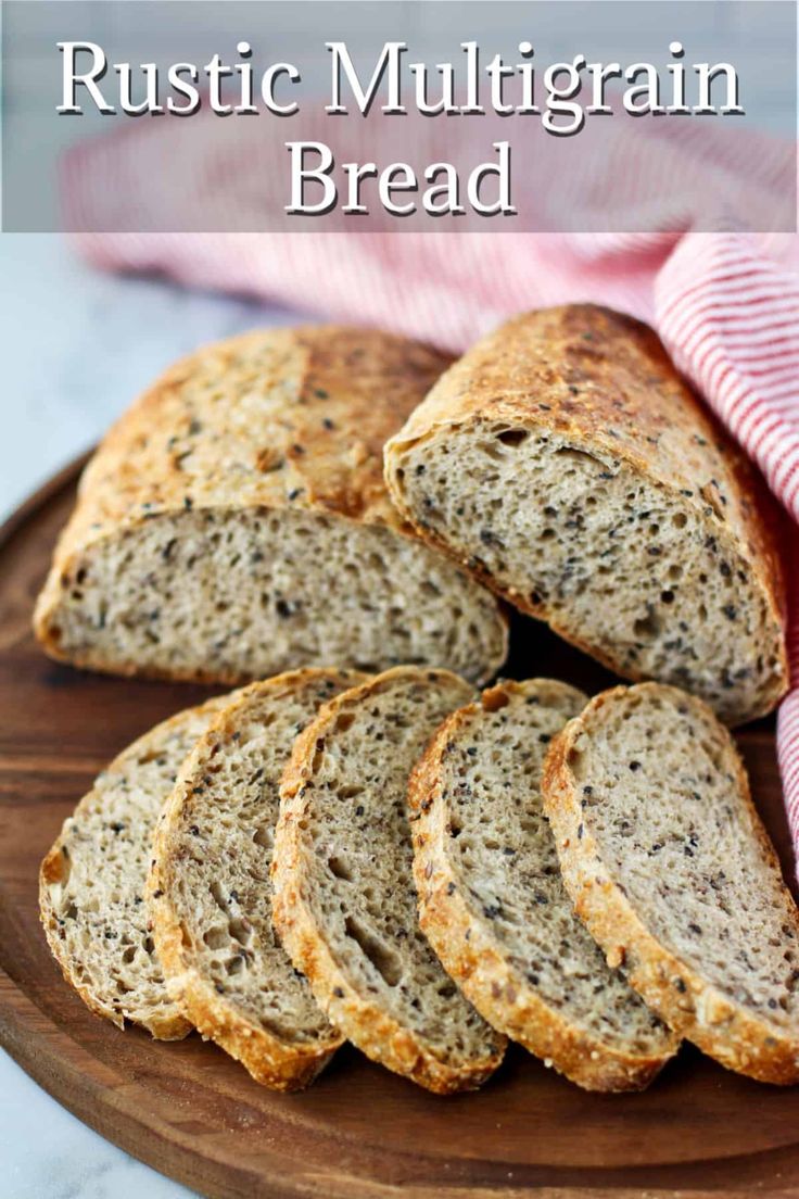 sliced bread on a wooden plate with text overlay that reads rustic mulligrain bread