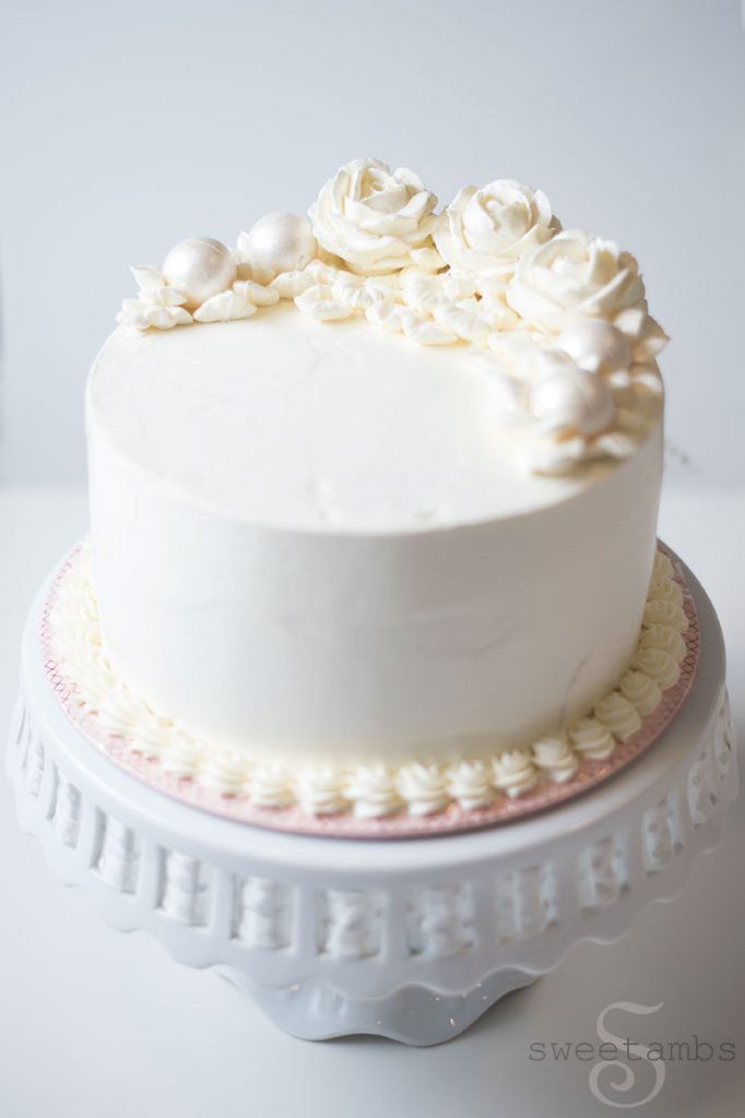 a white cake sitting on top of a table