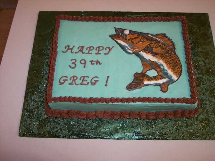 a birthday cake with a large fish on it that says happy 39 th grog