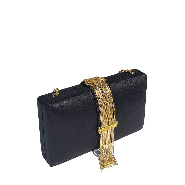 A style staple just like an LBD, our Noir Fringe is black but not basic! Simitri-fied with metallic tassels that are measured and cut by hand to give you an elevated and elegant clasp. This may be one of our clutches that is made for the universal taste but it is bound to become an obsession! Composition Black cruelty free silk clutch with hanging gold tassels on the front and back flap Lush black velvet interior lining Magnetic closure on top Size 8"W x 6"H x 2.5"D 20.5" cross body metal chain Gossip Girl Reboot, Mini Jumpsuit, Fringe Clutch, Silk Clutch, Velvet Interior, Silk Bag, Fashion Forecasting, Technology Fashion, Velvet Interiors