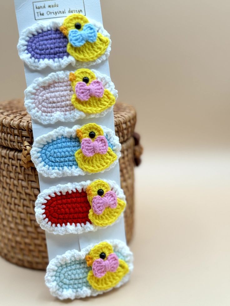 there are crocheted little birds on the bookmarks