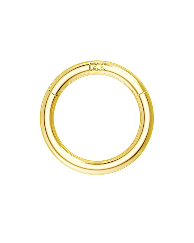 a gold ring on a white background