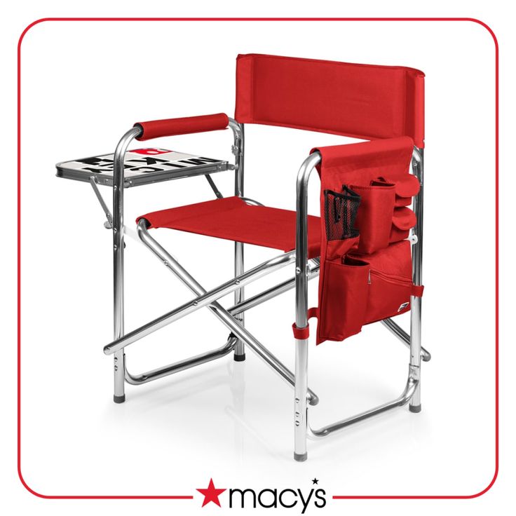 a red folding chair with a table underneath it