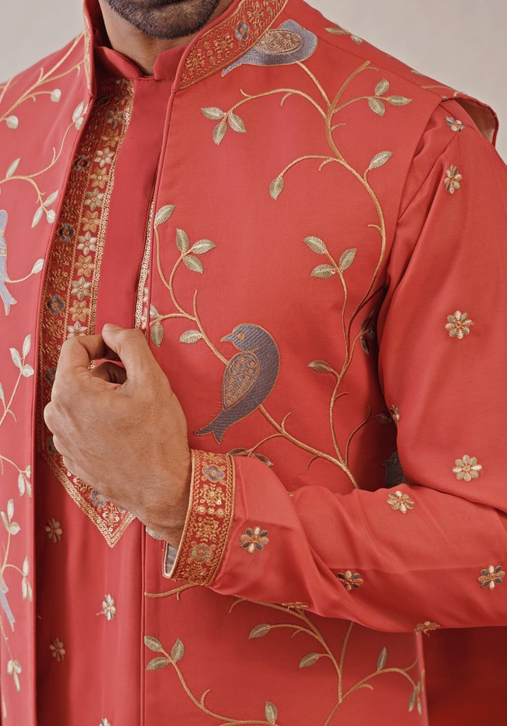 Radiate warmth in stunning Red Embroidered Jacket Kurta. Crafted from luxurious georgette, the front open jacket features resham and sequinned embroidery work. Teamed with a yoke design kurta adorned with all-over motifs. Completed with matching trousers and pure lining for ultimate comfort. Perfect for Sangeet, Mehendi, or as a wedding guest outfit. Composition : Jacket, Kurta & Trouser : Viscose Georgette Care: Dry Clean Only and Vacuum Storage This product can be customized for sleeves, lengt Kurta Set With Jacket, Design Kurta, Yoke Design, Vacuum Storage, Open Jacket, Indian Wedding Wear, Kurta Designs, Embroidered Jacket, Kurta Set