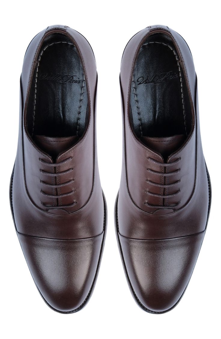 Handmade of smooth leather, this cap-toe dress shoe with a classic oxford silhouette offers a sophisticated, elegant look. Leather upper and lining/synthetic sole Made in Turkey Classic Oxford Lace-up Shoes With Rubber Heel Cap, Formal Oxford Cap Toe Derby Shoes, Formal Cap Toe Oxford Derby Shoes, Cap Toe Derby Shoes For Formal Occasions, Business Casual Goodyear Welted Cap Toe Oxfords, Timeless Cap Toe Oxfords For Business Casual, Classic Cap Toe Oxfords For Derby, Classic Oxfords With Leather Lining, Classic Cap Toe Derby For Formal Occasions