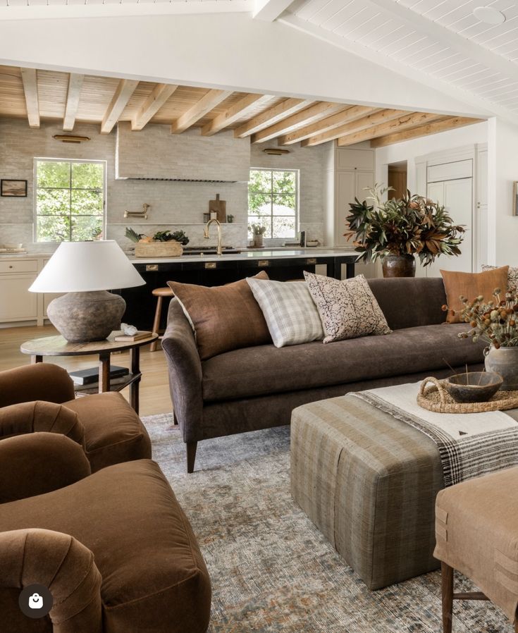 a living room filled with lots of furniture