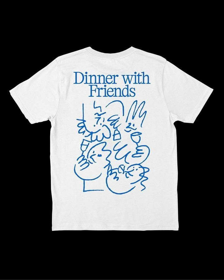 a white t - shirt with blue writing that says dinner with friends