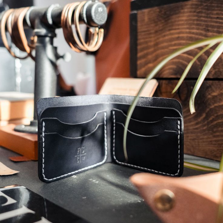 Our classic bifold wallet. 4 credit card slots able to carry 2-3 cards each once broken in and a bill slot for cash and receipts. Features 4 card pockets, 1 bill slot Open: 8.5" x 3.25" Closed: 4.5" x 3.25" Lifetime Guarantee Hand cut, stamped and sewn in Des Moines, IA Please allow an extra 2-3 business days for completion. Most online leather purchases are made to order. English Bridle, Des Moines Iowa, Leather Bifold Wallet, Leather Wallets, Natural Tan, Bifold Wallet, Des Moines, Custom Leather, Classic Leather