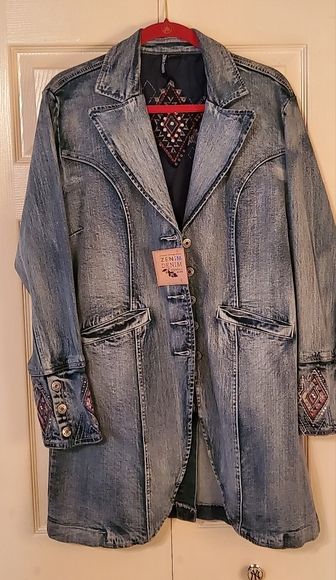 Shop pcazzalino's closet or find the perfect look from millions of stylists. Fast shipping and buyer protection. It's a denim long jacket with embroidery on the cuffs and back of jack.. size XL , but it fits like a large. Very beautiful embroidery. Spring Western Denim Outerwear, Western Denim Outerwear With Pockets, Western Style Medium Wash Outerwear For Spring, Western Style Long Sleeve Denim Outerwear, Western Long Sleeve Denim Outerwear, Western Style Fitted Medium Wash Outerwear, Fitted Western Style Medium Wash Outerwear, Denim Long Jacket, Jacket With Embroidery