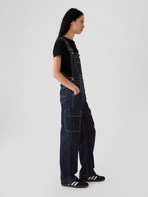 Relaxed Denim Cargo Overalls | Gap Utility Style Dark Wash Denim Jumpsuit With Bib Front, Dark Wash Utility Denim Jumpsuit With Bib Front, Utility Style Dark Wash Denim Jumpsuit, Dark Wash Utility Denim Jumpsuit, Utility Workwear Shortalls With Pockets, Utility Shortalls With Pockets For Workwear, Utility Overalls With Pockets For Workwear, Utility Denim Jumpsuit With Pockets For Work, Utility Style Workwear Shortalls With Pockets