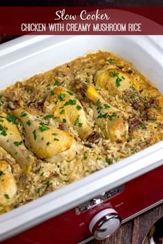 slow cooker chicken with creamy mushroom rice in a red casserole dish on a wooden table