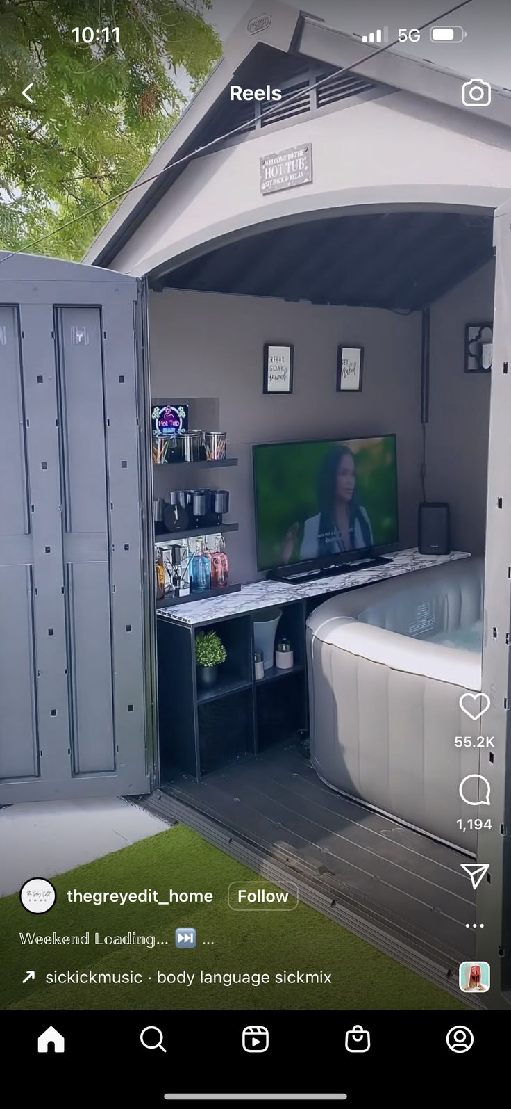 an outdoor hot tub with a television in it