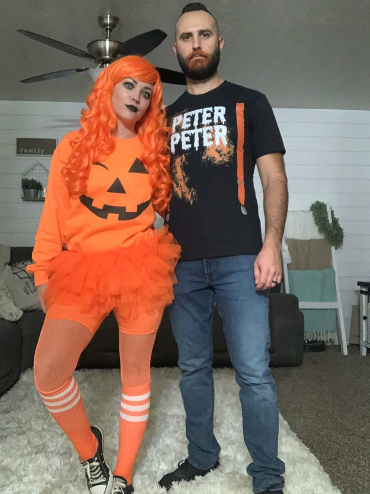 a man and woman dressed up in halloween costumes