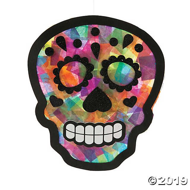 a paper cut out of a colorful skull