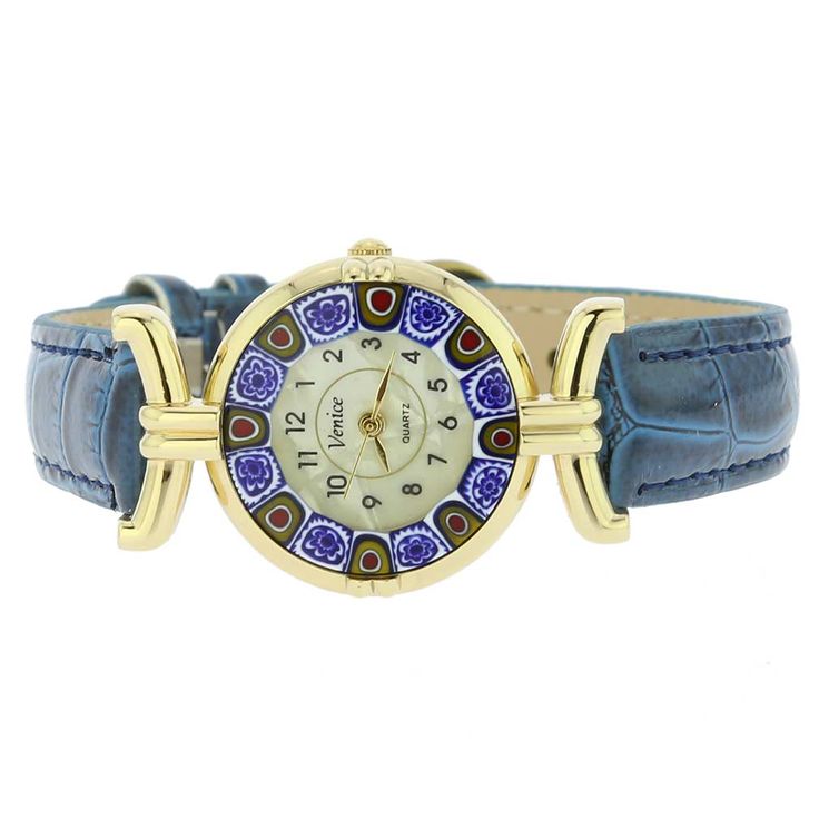 This elegant Murano glass watch is a fine timepiece featuring high-quality workmanship and the most famous Murano technique- Millefiori (a thousand flowers)- which has become famous far beyond the shores of Murano and Venice. Bright stylized flowers made from exquisite glass mosaics grace the hand-made face of this watch for a look of elegance and Italian style. This Murano watch adds a perfect accent to any wardrobe and works equally well for your casual outing, a party, or a special occasion. Elegant Blue Watch With Skeleton Dial, Elegant Blue Skeleton Dial Watch, Elegant Blue Watch Accessories With Metal Dial, Elegant Blue Watch With Leather Strap, Elegant Blue Watches For Gifts, Elegant Blue Analog Watch, Elegant Blue Watch Accessories For Gift, Elegant Blue Watch Accessories As Gift, Red Nail Varnish