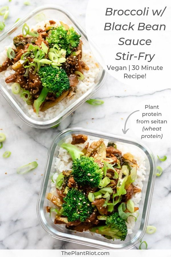 broccoli and beef stir fry in plastic containers on a white marble counter top