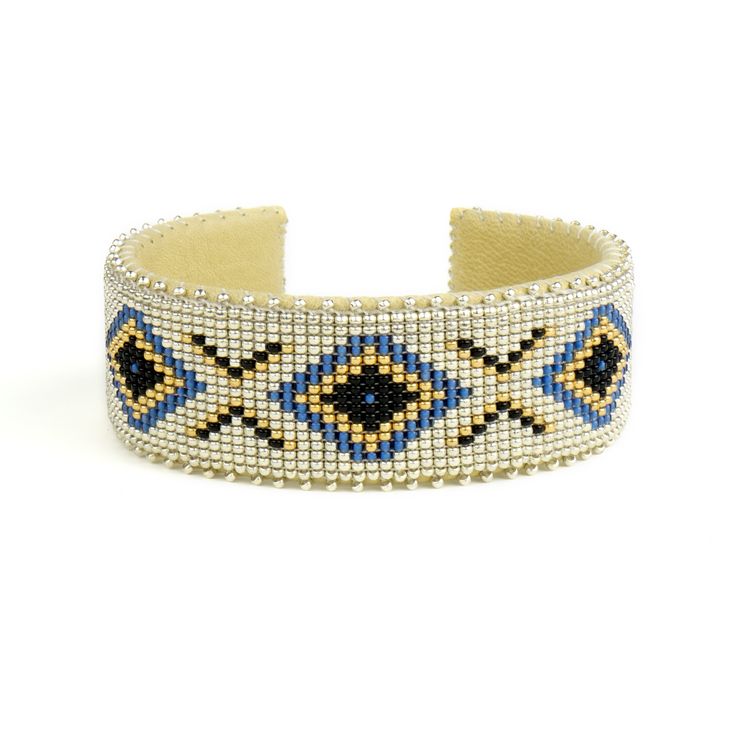 ETKIE bracelets are hand-beaded in collaboration with talented Navajo artisans in New Mexico. Southwestern Style Handwoven Bracelets, Southwestern Style Beaded Bangle Bracelet, Southwestern Beaded Bangle Bracelet, Handmade Southwestern Beaded Bangle Bracelet, Southwestern Style Beaded Bangle Bracelets, Southwestern Beaded Bangle Bracelets, Artisan Beaded Bangle Bracelet, Artisan Handwoven Beaded Bangle Bracelet, Handwoven Southwestern Style Bracelets For Festivals