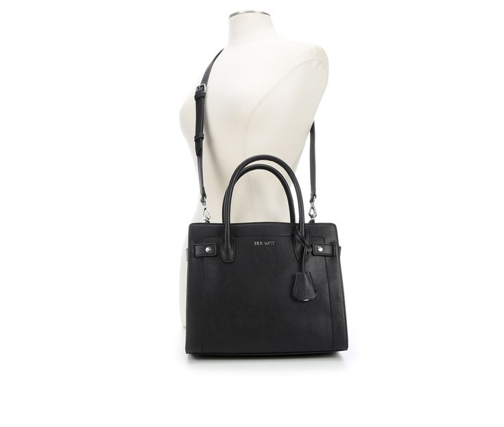 Synthetic leather construction with fabric lining, Top carry handles and removable shoulder strap, Large main compartment with zipper closure and internal zippered and slip pockets,2 large slip pockets, Includes removable keychain, Approx. 9 1/2 inches H x 11 inches W x 5 inches D, Nine West branding details | Nine West Bettina Satchel Handbag in Black Shopping Satchel Shoulder Bag With Adjustable Strap, Adjustable Strap Shoulder Satchel For Shopping, Classic Bags With Adjustable Strap For Shopping, Shopping Satchel Bag With Adjustable Handle, Classic Shopping Bag With Adjustable Handle, Adjustable Strap Double Handle Satchel For Shopping, Classic Shopping Shoulder Bag With Adjustable Handle, Classic Satchel With Adjustable Handle For Shopping, Classic Shoulder Bag With Adjustable Handle For Shopping