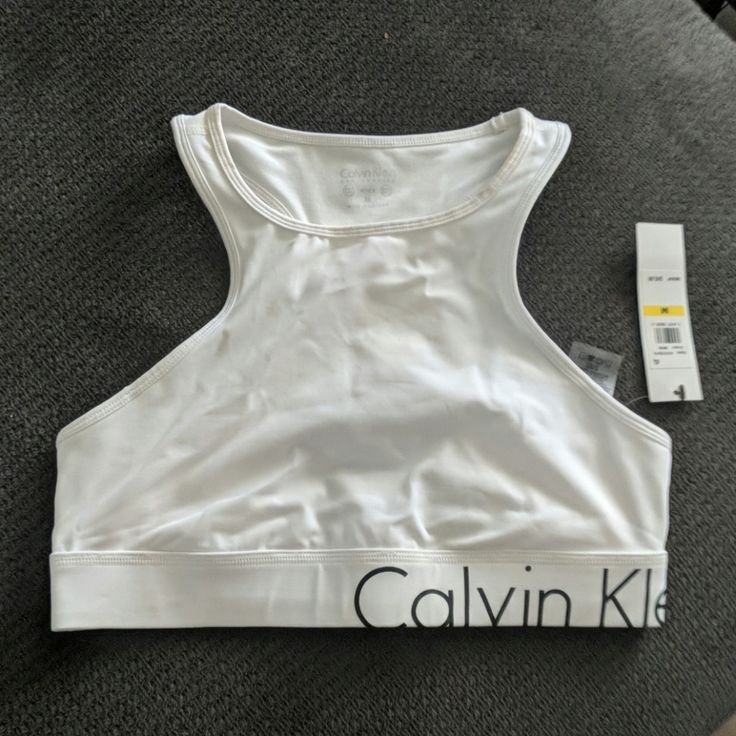 Nwt Size M See Pics For Slight Makeup Transfer Fitted Calvin Klein Athleisure Tops, Calvin Klein Fitted Sports Bra For Athleisure, Calvin Klein Fitted Sports Bra, Calvin Klein Sporty Activewear With Medium Support, Calvin Klein Fitted Athleisure Sports Bra, Calvin Klein Sporty Stretch Top, Calvin Klein Sporty Fitted Sports Bra, Calvin Klein Sporty Activewear For Gym, Sporty Calvin Klein Tops For Sports