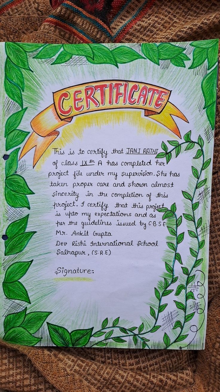 a paper sign with the words certificate written in front of it on a burliege cloth