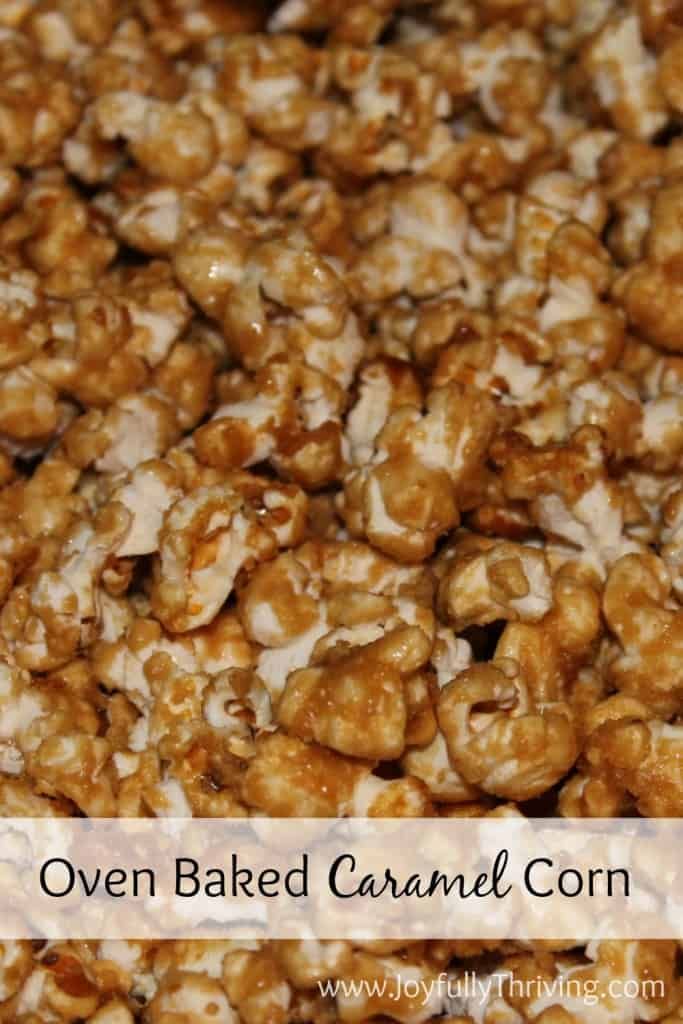 caramel popcorn is sitting on top of a table with the words oven baked caramel corn