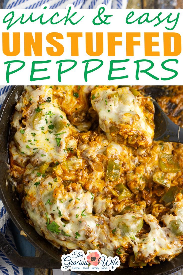 a skillet filled with stuffed peppers and cheese