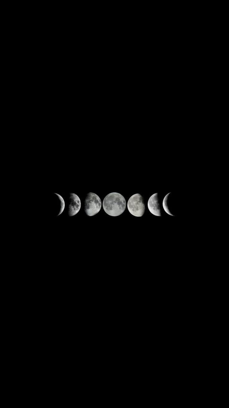 five phases of the moon are shown in black and white, with only one half visible