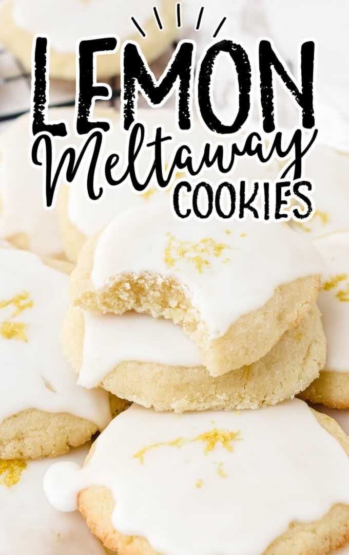 lemon meltaway cookies with white icing and sprinkles are stacked on top of each other