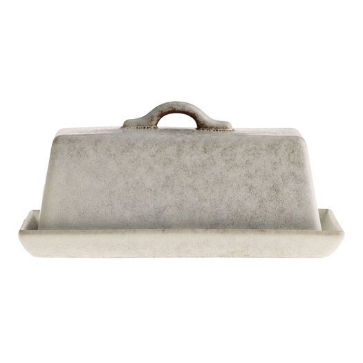 a white tray with a handle and handles on it's side, in the shape of a purse