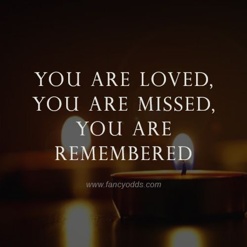 a candle with the words you are loved, you are missed, you are remembranced