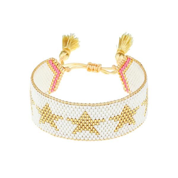 Oh my lucky stars! This bracelet features gold stars shining against a matte white background. CARE: *Hart’s beaded bracelets are delicate due to their handmade construction and delicate materials like fragile glass beads and handcrafted tassels. Please treat your bracelet with extra TLC. Avoid banging your wrist against surfaces, washing dishes and swimming in your bracelet, and throwing the bracelet in your handbag. Click here to learn more about how these gems are made with love. *The tassels Unrealistic Wishlist, Adjustable Beaded Bracelet, Sparkle Bracelet, Pirate Treasure, School Jewelry, Custom Charms, Meaningful Jewelry, Star Bracelet, Preppy Outfit