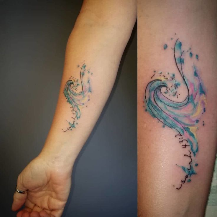 two tattoos on the arms of people with blue and pink ink, one is an abstract wave