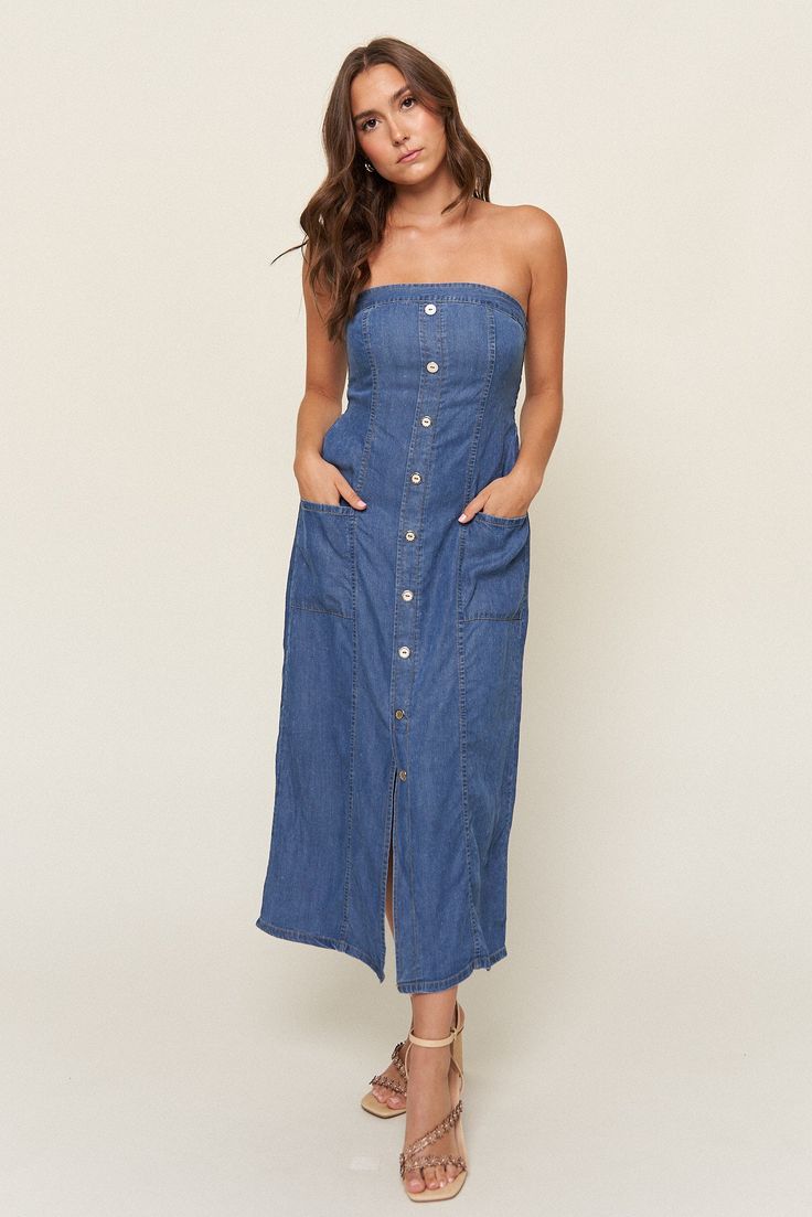 The "Tahoma" dress is everything you love about denim dressing, with all the comfort of breezy linen. This nostalgic piece is inspired by Lo's love for 90s styling and named after her favorite summer hideaway. This strapless style is fitted to be "bra optional" and has a shirred back panel for adjustability and support. Our favorite part about this dress? Besides the pockets, this baby has a gorgeous fixed button placket that ends with a split seam, giving this timeless piece an elevated look th Summer Cotton Denim Dress Washed, Summer Casual Denim Dress With Pockets, Casual Fitted Denim Maxi Dress, Casual Cotton Denim Dress With Pockets, Fitted Cotton Denim Sundress, Beach Denim Dress In Medium Wash Cotton, Medium Wash Cotton Summer Dress, Light Wash Cotton Denim Beach Dress, Beach Light Wash Cotton Denim Dress