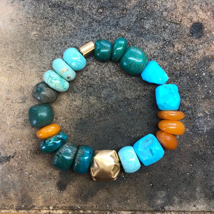 ANCIENT STONE BRACELET WITH 22K GOLD CLOSURE • DESIGNED AND HAND FORGED IN NEW YORK • STONES: CHALCEDONY, AMBER AND TURQUOISE BEADS • LENGTH: 6.5 INCHES Please email info@elihalili.com or call the studio at 212-941-7979 for any inquiries. Luxury Yellow Gold Bracelets With Stones, Gold Beaded Gemstone Bracelets For Jewelry Making, Luxury Gold Bracelets With Gemstone Accents, Luxury Yellow Gold Bracelets With Natural Stones, Yellow Gold Bangle Bracelet With Gemstone Accents, Gold Bohemian Rondelle Bracelets, Bohemian Gold Rondelle Bracelets, Luxury Natural Stones Bracelets, Gold Fusion Bracelets With Round Beads