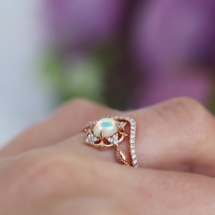 Natural Vintage Inspired Opal Ring ►Base Metal: Sterling Silver (925) ►Plating: 14K Rose Gold ►Accented With Simulated Diamonds (CZ) Gem size: 6.0 x 4.0 mm Carat Weight: 0.43 ct. Stone Creation: Natural Stone Origin: Brazil ► Solid rose gold ring can be purchased at: https://www.etsy.com/listing/694593215/vintage-natural-opal-ring-14k-solid-gold?ref=shop_home_active_1&frs=1 ►Sterling silver ring can be purchased at: https://www.etsy.com/listing/675970602/vintage-natural-opal-ring-sterling?re Australia Accent, Opal Wedding Ring Set, Rose Gold Ring Set, Australian Opal Ring, October Birthstone Jewelry, Natural Opal Ring, Opal Wedding Rings, Engagement Rings Opal, 14k Rose Gold Ring