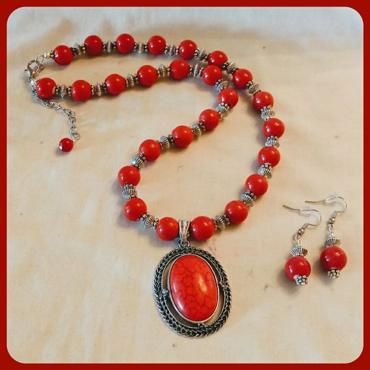 Red Ceramic Beads Are Combined With Silver Beads And A Red Pendant To Create This Beautiful Necklace. Necklace Is 19 Inches Long Plus Has A 3" Extender. Has A Lobster Claw Clasp. Matching Earrings Are 1-3/4 Inches Long From The Top On The Silver Nickel Free Ear Wire. Necklace And Earrings Are New And Handmade By Me. Handmade Oval Beads Red Coral Jewelry, Handmade Red Coral Oval Beads Jewelry, Handmade Red Coral Jewelry With Oval Beads, Red Polished Beads Round Jewelry, Handmade Adjustable Red Jewelry Sets, Adjustable Handmade Red Jewelry Sets, Red Adjustable Round Jewelry Sets, Red Jewelry With Faceted Beads, Adjustable Red Necklaces With Oval Beads