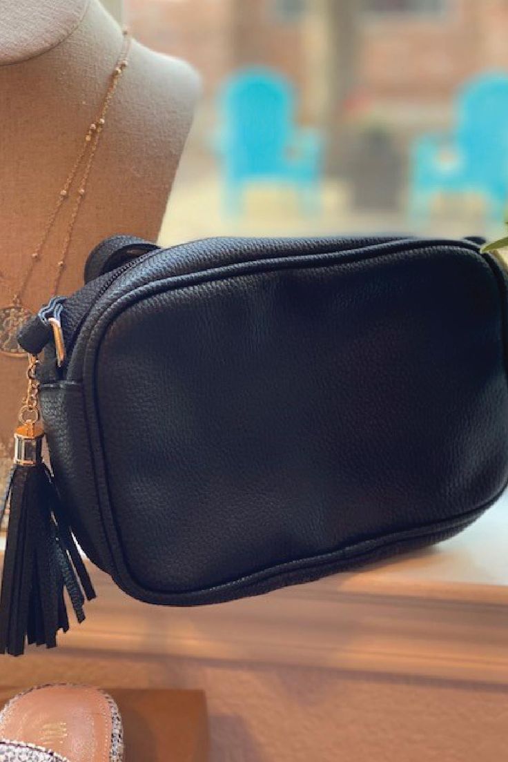 8.5"x6"x2.5" Vegan Adjustable Strap Tassel Zipper Pull Full Closure Gold Hardware Lined Inside Black Casual Bags With Tassels, Casual Black Bags With Tassels, Casual Black Tassel Bags, Black Travel Shoulder Bag With Tassels, Black Tassel Crossbody Bag, Black Bags With Tassels For Everyday Use, Black Tassel Bag For Everyday Use, Black Shoulder Bag With Tassels For Everyday Use, Zipper Pulls