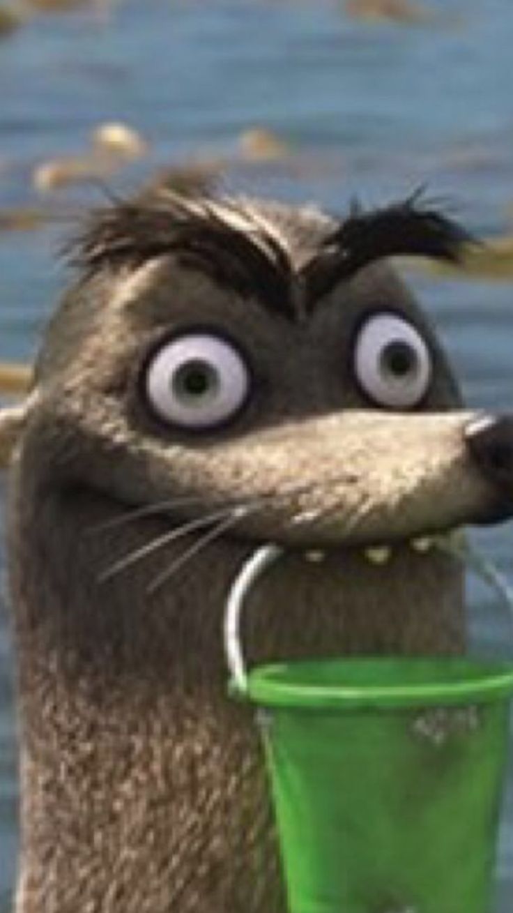 a cartoon character holding a green bucket in the water with his mouth open and eyes wide open