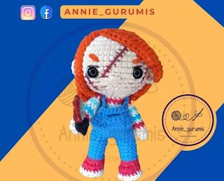 a crocheted doll with an orange hair and blue overalls is shown in front of a yellow background