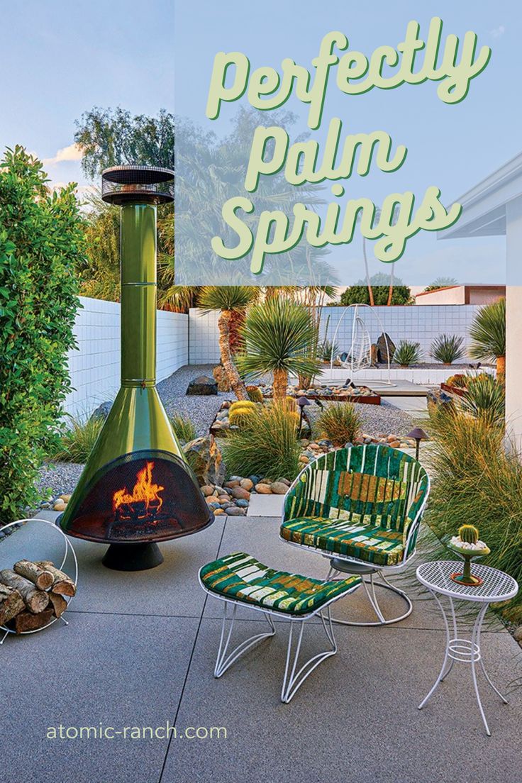 an outdoor patio with chairs, fire pit and potted plants in the back yard