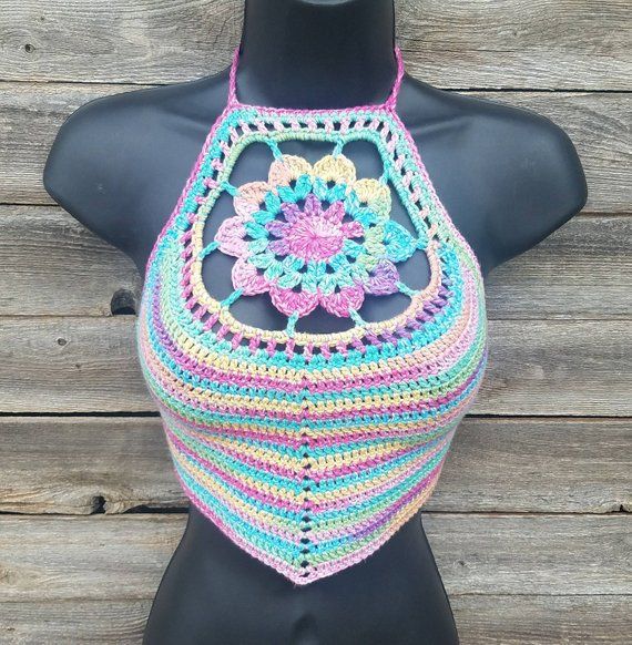 a crocheted halter top on a mannequin