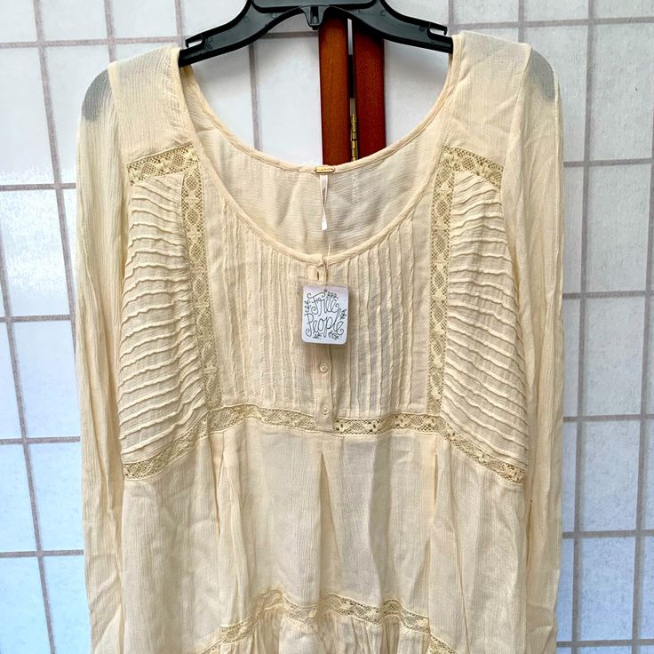 Free People Long Sleeve Shirt Light And Thin Long Sleeve Hi-Low Length And Ivory Color Nwt And Good Condition Perfect For Spring Wear Free People Long Sleeve, Spring Wear, Ivory Color, White Tops, Shirt Color, Free People Tops, Long Sleeve Shirt, Sleeve Shirt, Colorful Shirts