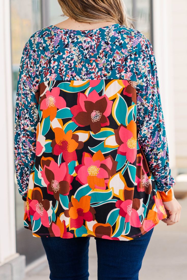 This must have top boasts a striking combination of multi-layered floral patterns in vibrant shades of teal, black, and fuchsia! This bold and eye-catching design is perfect for those looking to make a statement with their fashion choices! Made for all our trendy ladies in mind, this top is sure to make you stand out in any crowd! 95% Polyester, 5% Spandex Bohemian Tops With Bold Print For Spring, Bohemian Bold Print Top For Spring, Bohemian Top With Bold Print For Spring, Bold Vibrant Print Tops For Spring, Bohemian Floral Print Tops For Layering, Vibrant Multicolor Print Tops For Fall, Green Tops With Colorful Pattern For Fall, Multicolor Floral Print Tops For Fall, Green Top With Vibrant Print For Fall