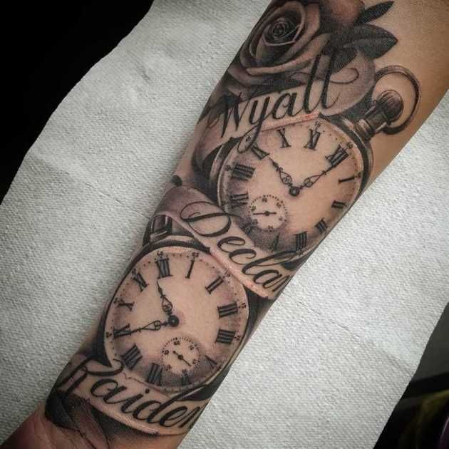 an arm with two clocks and roses on it