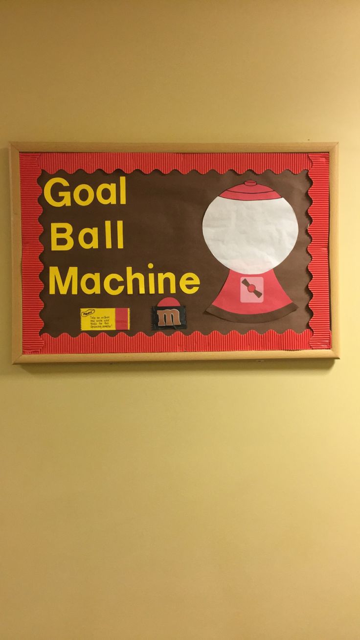 there is a sign on the wall that says goal ball machine