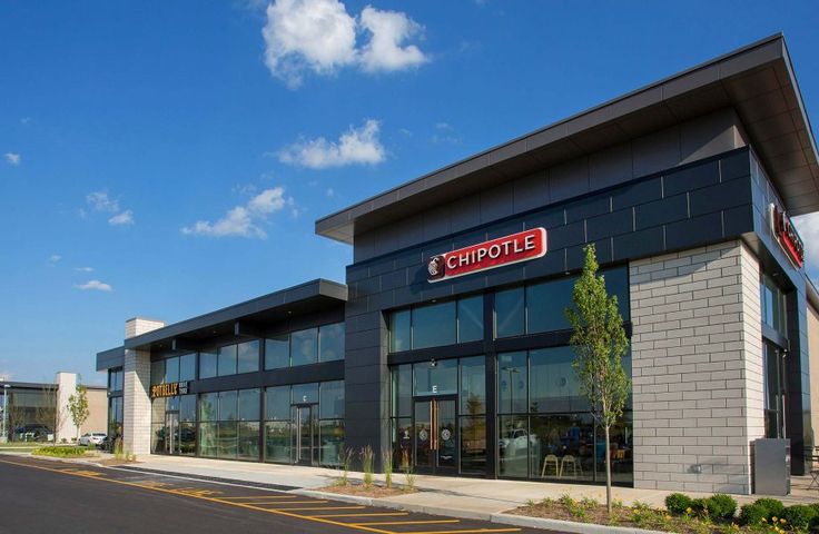 an empty parking lot in front of a store